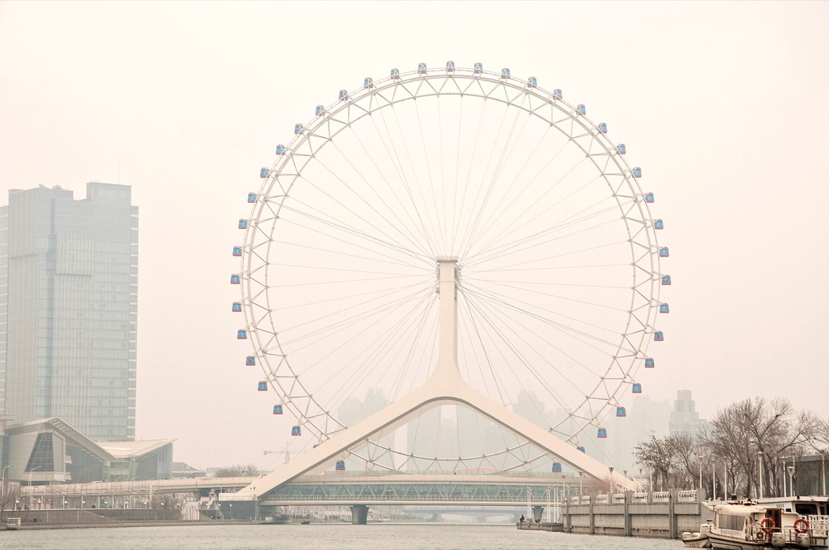 The Tianjin Eye ferris wheel over the Haihe River
