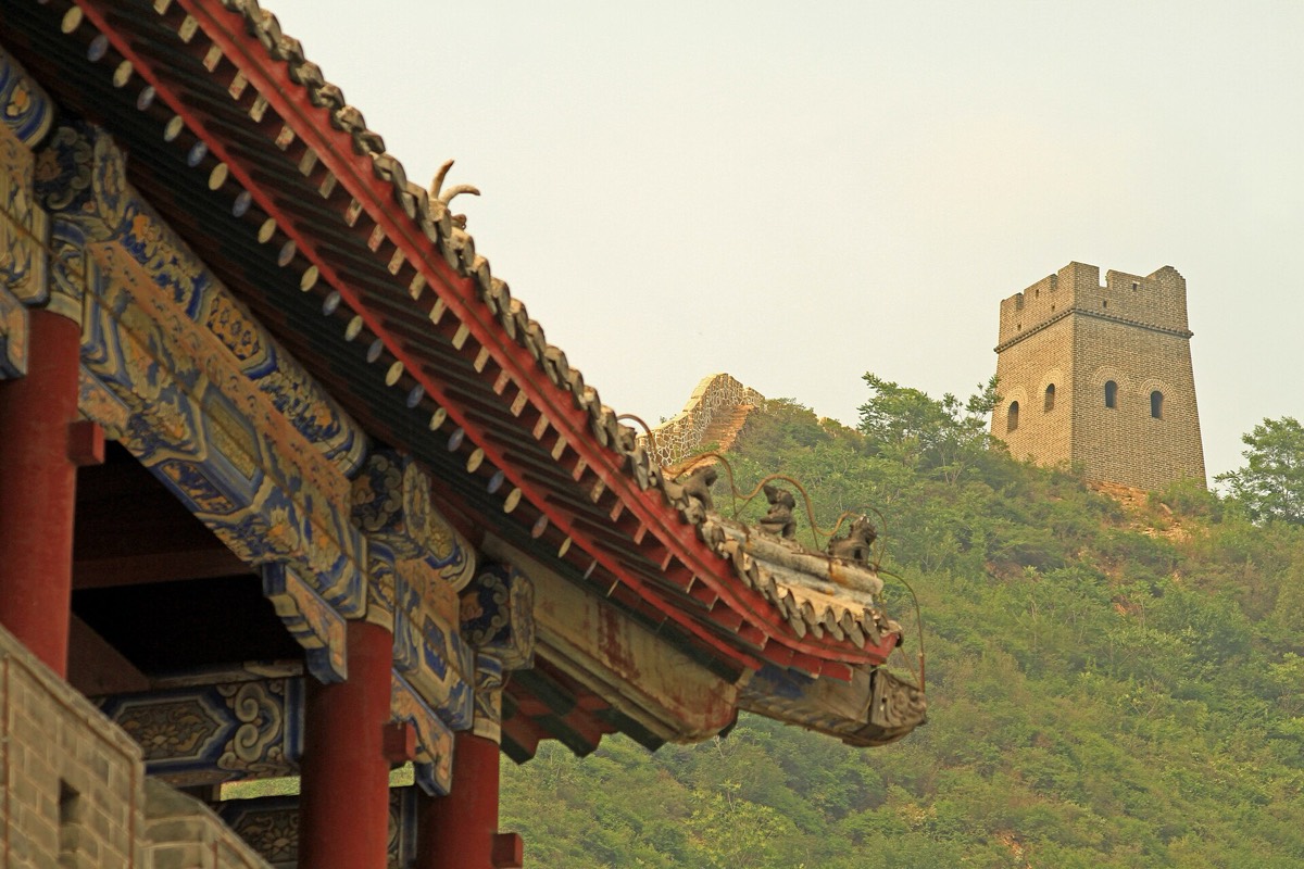 The Great Wall winding over green mountains at Huangyaguan